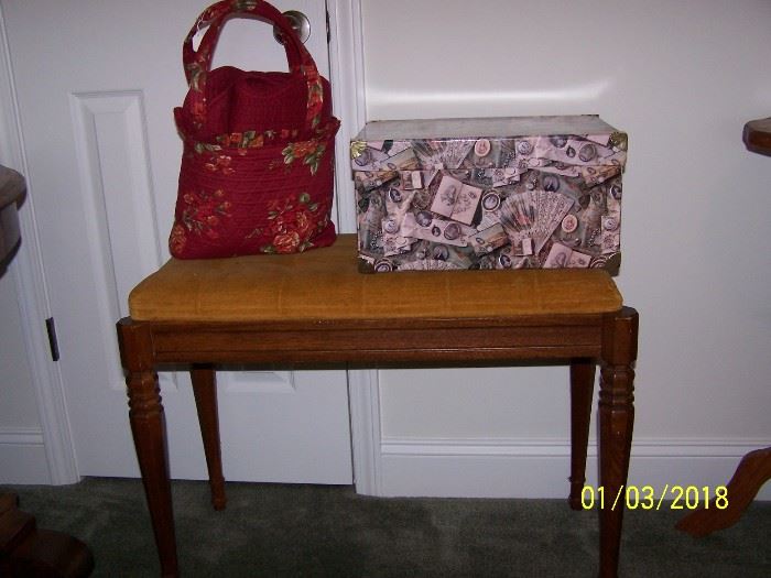 Upholstered Bench,  Decorator Box and  bag with a Throw
