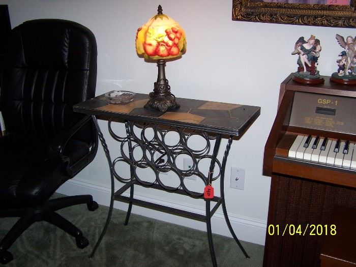 small Table (looks like a wine rack underneath) small Lamp