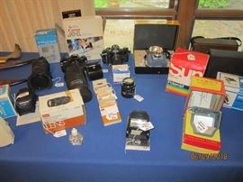 Lots of vintage cameras and accessories