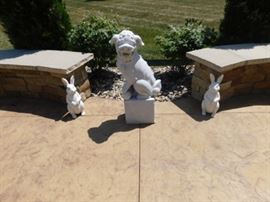 Concrete Foodog statuary and rabbits 