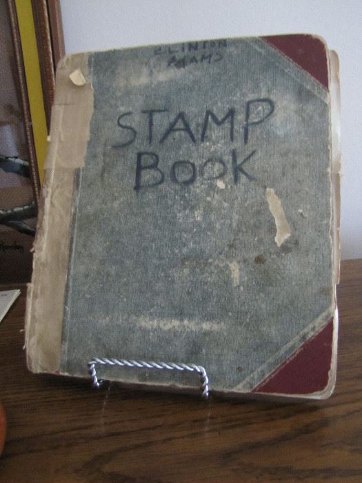 Stamp book started in 1933 fairly full