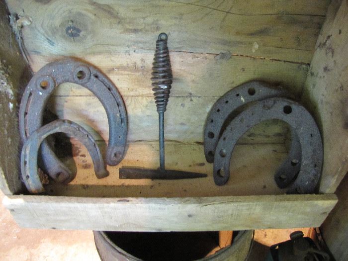 Horse shoes, and a welding pick
