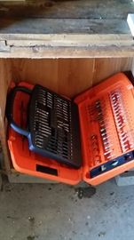 Under the work bench Black & Decker drill bit set