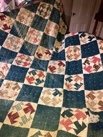 Lots of beautiful handmade quilts and quilt tops