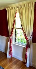 Ivory window treatments with burgundy accents
