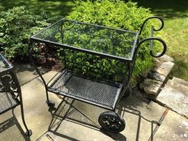 Vintage wrought iron bar cart.