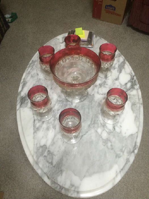 Marble top coffee table w/ flashed vintage glasses. Also have marble top end tables and server
