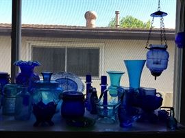 Blue glass including Shirley temple pitchers, Fenton, Antique and new