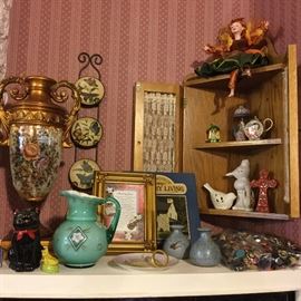 Corner shelf, bags of buttons, mark Robert fairy, etc.