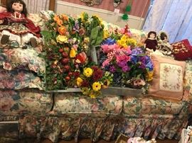 Floral sofa, floral swags, and flowers