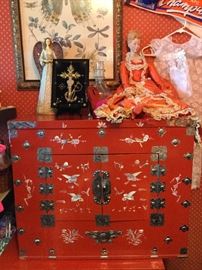 Red lacquer mother of pearl inlaid chest, center doors open