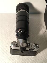 Camera and Lens in Metal Case             https://ctbids.com/#!/description/share/26802