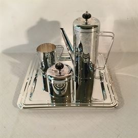 Silver Plate Tray, Coffee Carafe, Cream and Sugar Containers.      https://ctbids.com/#!/description/share/26857