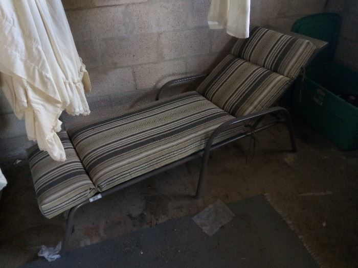Patio chair with cushion at sat Beach estate