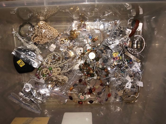 some of the jewelry some silver and gold in there  plus there are binate silver coins