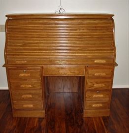 PHENOMENAL ROLL TOP DESK WITH KEY - SEE NEXT PICTURE. IF YOU ARE IN THE MARKET FOR A DESK "THIS IS IT" !