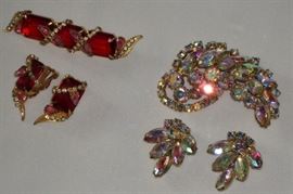 (RIGHT) VINTAGE AURORA BOREALIS BROOCH & EARRINGS, (LEFT) VINTAGE EMERALD CUT " RUBY RED" BROOCH & EARRINGS