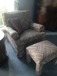 One of two matching chairs; ottoman