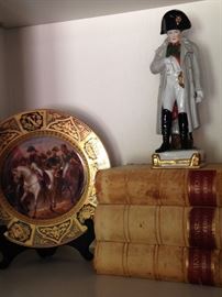Plate and figurine of Napoleon  (Napoléon Bonaparte was a French statesman and military leader who rose to prominence during the French Revolution.)  