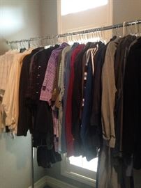 Many shirts and sweaters