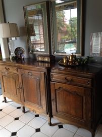 Stunning antique buffet with three sections that provide great storage