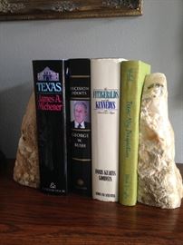 Some of the many books; stone bookends