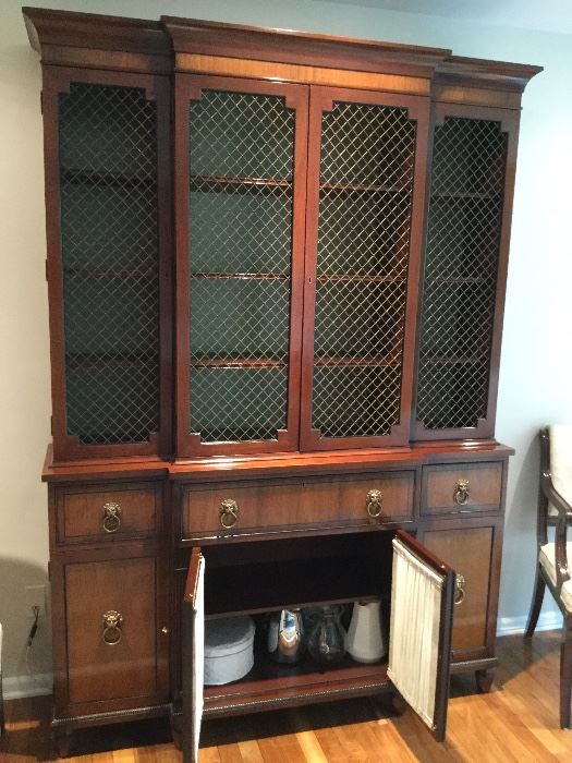 Kittinger school breakfront features mahogany construction with satinwood inlaid banding, four door upper china cabinet with adjustable shelves; lower with three upper drawers over 4 lower cabinets  locking and with key 20th century. with lions head drawer pulls BUY IT NOW $495