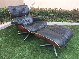Authentic Charles Eames Chair & Ottoman by Herman Miller. Rosewood Shell and Down Filed. As-is condition. 