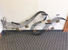 A Signed Jere Musical Note Wall Scuplture