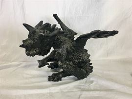 Solid Metal Sculpture of a Dragon