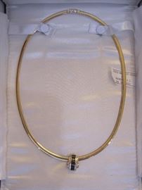 A second 14kt gold Omega Necklace with a diamond and sapphire Slide.