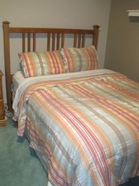 Queen Size Bed with all bedding.