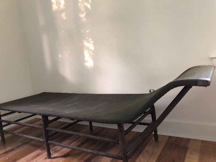 Daybed. Army green canvas with brass tipping. $350