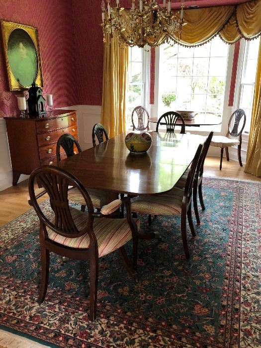 Dining room with (2) pads,(1) leaf, (2) armed chairs, (6) dining chairs