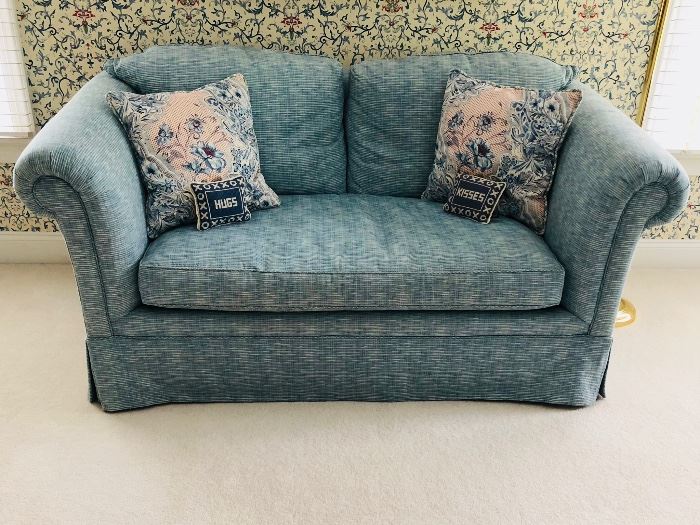 Deep seated, ultra soft and comfy light peacock blue and ivory down loveseat