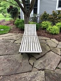 Outdoor teak lounger with wheels