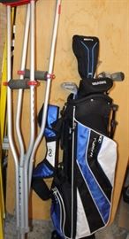 crutches and junior golf clubs