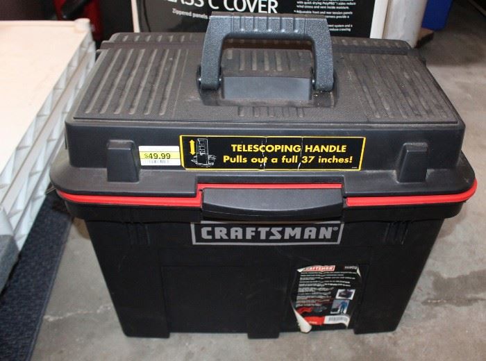 Nice tool box and great gift for dad.  has a telescoping handle like luggage