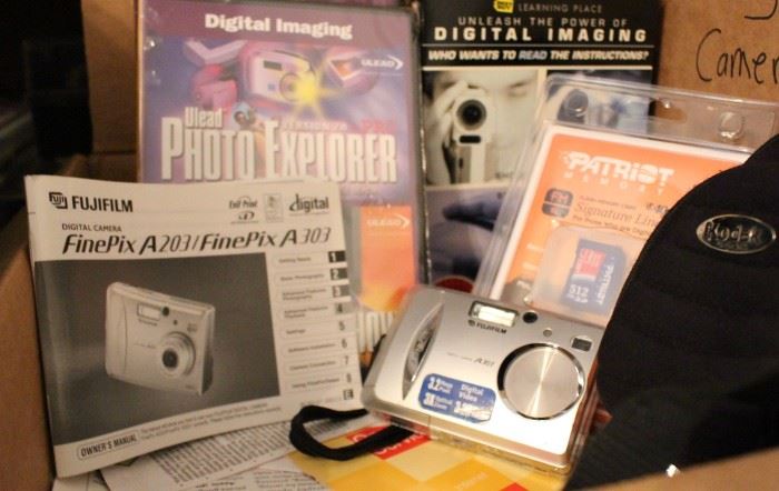 Never used Fujifilm finePix digital camera and accessories, books, etc.