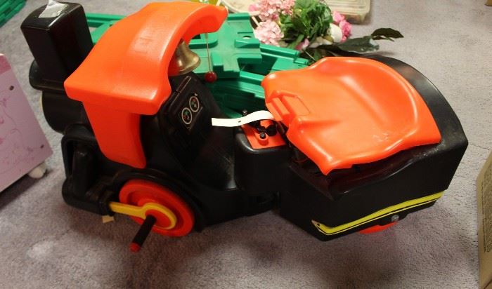 This is a ride-on Train - See the Green track; it rides on the track.  Cute for a toddler