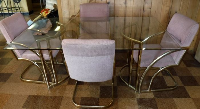 Glass top table & four upholstered chairs
