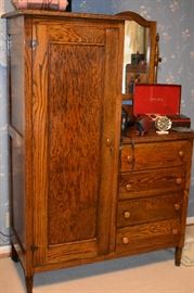 Antique American Oak Gentlemens Dresser with Side Closet, 4 Drawer Chest with Adjustable Mirror also Vintage Camera's and Alarm Clock are pictured