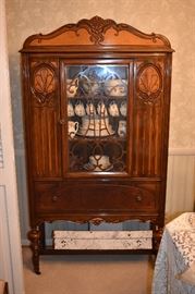 Beautiful Circa 1920's Dining Room Suite featuring Dining Table, 6 Matching Chairs, China Closet, and Buffet featuring Tudor Legs and Carvings