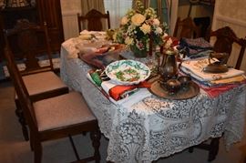 Beautiful Circa 1920's Dining Room Suite featuring Dining Table, 6 Matching Chairs, China Closet, and Buffet featuring Tudor Legs and Carvings