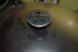 Cory Party Chef Space Age Atomic Server Buffet Fry Pan Electric Skillet. This Cory Party Chef Spaceship Mid Century Atomic Server Buffet Fry Pan is in good condition, tested and works perfectly. Temperature settings range from warm all the way up to 400°. An awesome server in a fantastic mid-century 1950's design! The outside body is polished silver tone aluminum (band) and copper-tone matte aluminum (top and bottom) and is SUPER CLEAN. The lids handle has a very minor dent. The interior cooking & warming area is silver-tone aluminum and in GREAT CONDITION. The black feet and arms/handles are heavy weight plastic with NO wear and NO damage. There are no instructions, but, the inside of the lid includes a basic guide to temperatures. The plug/cord is super clean little to no signs of wear. This COOL FRY PAN measures 18 1/2" handle to handle, 12" across the interior cooking area and about 8" high when the lid is on.