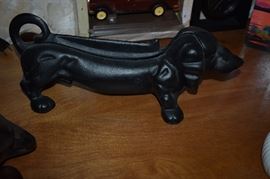 One of two Cast Iron Shoe Scrapper Dachshund