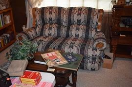 Rocker Recliner Love Seat (can stretch out into a bed) which is a part of the Living Room Set that also includes the matching Sofa and Easy Chair