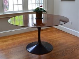 Eero Saarinen tulip table (54" wide) with black base and wood veneer top