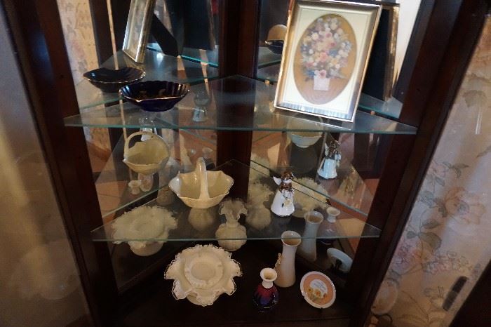 items in corner curio cabinet