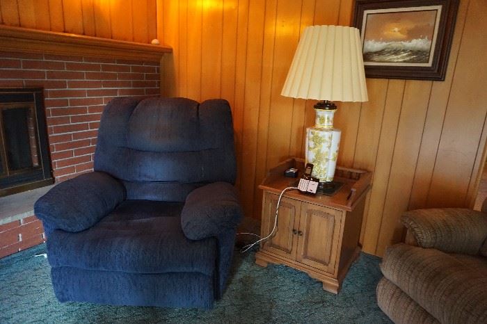 blue recliner, end table, lamp
